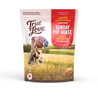 Bag of True Love dog treats with a scenic background. Harvest Supper flavour - savoury beef broth and garden carrots.